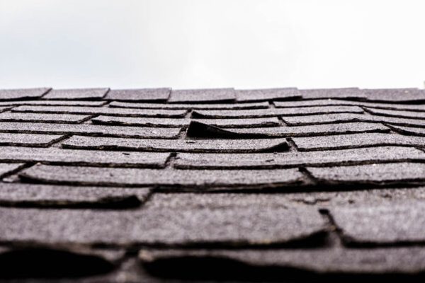 damaged shingles on a roof in mentor ohio