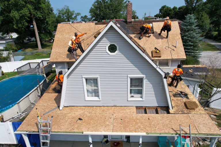 RAW Roofing Solutions crew installing new roof decking on a home in Lake County, Ohio